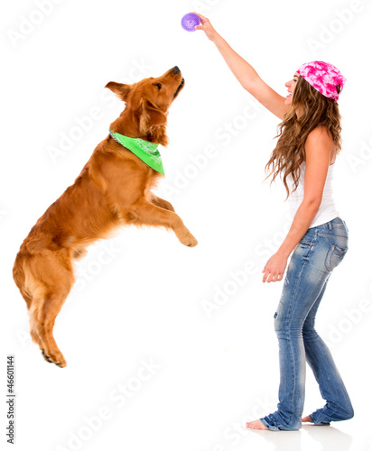 Photo: Woman playing with her dog Woman playing with her dog