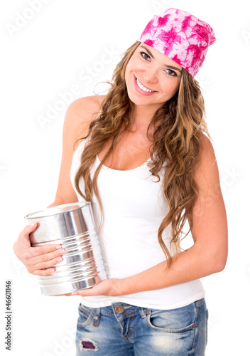 Photo: Woman holding a paint can Woman holding a paint can