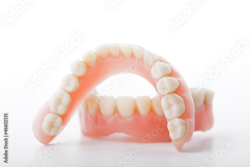 Photo: medical denture smile jaws teeth on white background medical denture smile jaws teeth on white background