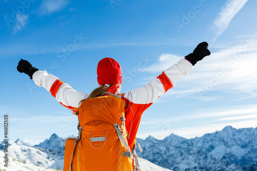 Photo: Hiking success, woman in winter mountains Hiking success, woman in winter mountains