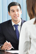 Photo: Happy businesspeople or businessman and client Happy businesspeople or businessman and client