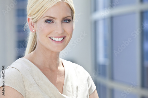 Photo: Blond Woman or Businesswoman With Blue Eyes Blond Woman or Businesswoman With Blue Eyes
