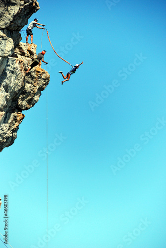 Photo: Jump off a cliff with a rope. Jump off a cliff with a rope.