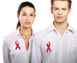 Photo: Couple using red for AIDS, isolated on white background Couple using red for AIDS, isolated on white background