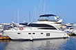 White motor yacht over harbor pier, Odessa, Ukraine