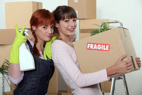 Photo: Two female friends moving house Two female friends moving house