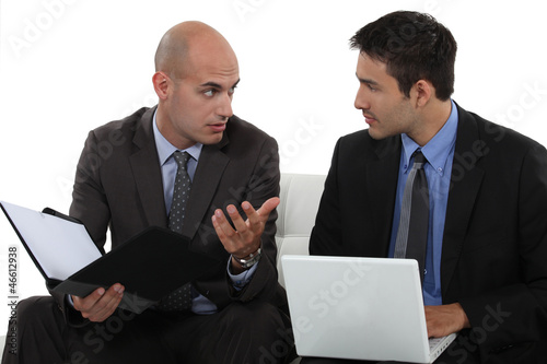 Photo: Men discussing a business proposition Men discussing a business proposition