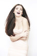 Foto: portrait of young beautiful woman on white background portrait of young beautiful woman on white background
