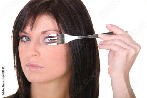 Photo: Woman with a fork Woman with a fork
