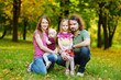 Family of four at autumn