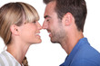 Photo: A couple about to kiss. A couple about to kiss.