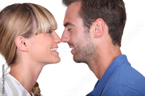 Photo: A couple about to kiss. A couple about to kiss.