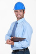 Supervisor holding clipboard