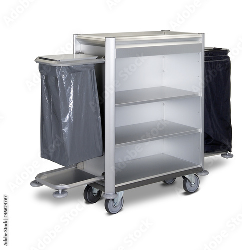 Photo: The hotel cleaning tool cart isolated The hotel cleaning tool cart isolated