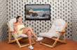 Beautiful happy woman sitting in the salt room