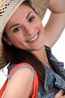 Brunette woman with hat