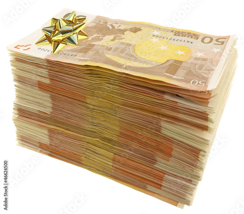 Photo: noeud cadeau doré sur liasse de billets noeud cadeau doré sur liasse de billets