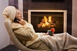 Happy woman relaxing in beauty mask