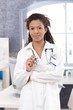 Photo: Portrait of attractive female doctor smiling Portrait of attractive female doctor smiling
