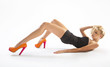 Young lady wearing orange high-heels