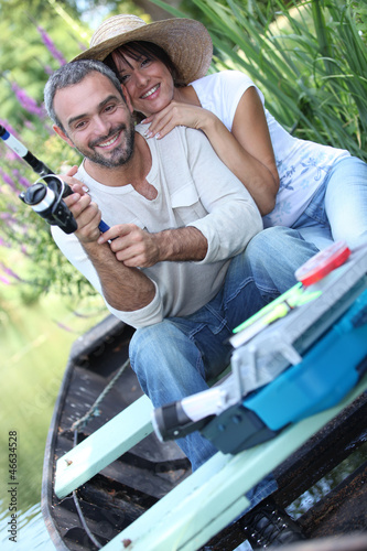 Photo: Man and woman fishing on the river Man and woman fishing on the river
