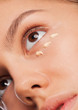 Woman applying foundation