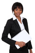 African woman with notebook in hand
