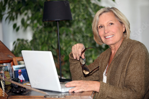 Photo: Woman working at home Woman working at home