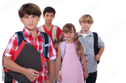 Photo: Schoolchildren with backpacks Schoolchildren with backpacks