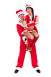 Happy young couple wearing santa claus clothes