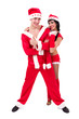 Happy young couple wearing santa claus clothes