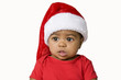 Beautiful baby wearing a christmas hat