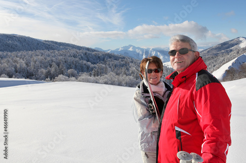 Photo: Couple going cross-country skiing Couple going cross-country skiing