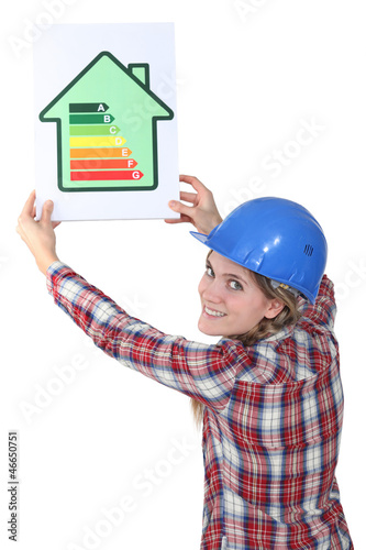 Photo: Woman with a house energy sign Woman with a house energy sign