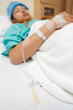 Woman patient and medical instrument