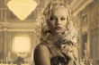 blonde girl with silver mask looks at right