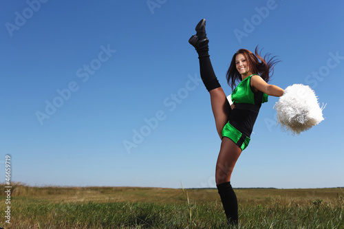 Photo: Young female dancer against white background Young female dancer against white background