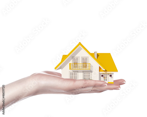 Photo: The house in human hands The house in human hands