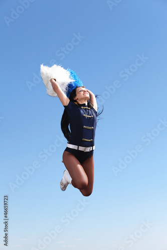 Photo: Young female dancer against white background Young female dancer against white background