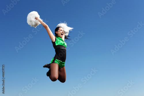 Photo: Young female dancer against white background Young female dancer against white background