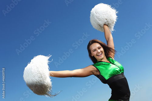 Photo: Young female dancer against white background Young female dancer against white background