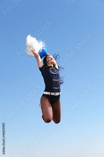 Photo: Young female dancer against white background Young female dancer against white background