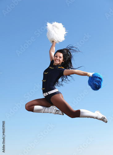 Photo: Young female dancer against white background Young female dancer against white background