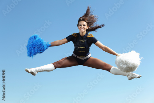 Photo: Young female dancer against white background Young female dancer against white background