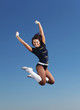Young female dancer against white background