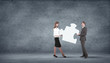 Piece of puzzle and business persons