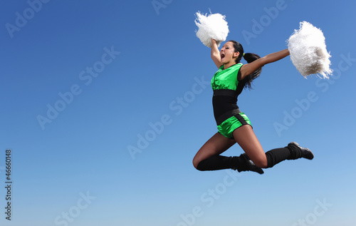 Photo: Young female dancer against white background Young female dancer against white background