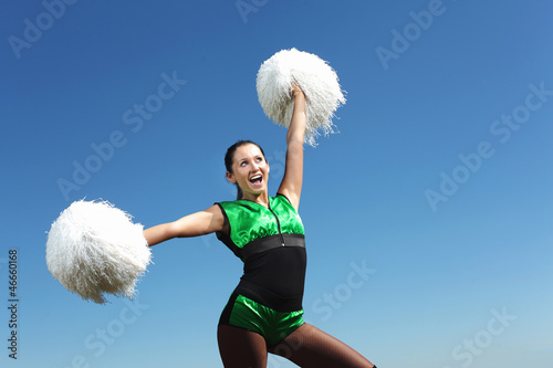 Photo: Young female dancer against white background Young female dancer against white background