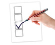 Hand with pen and a checklist
