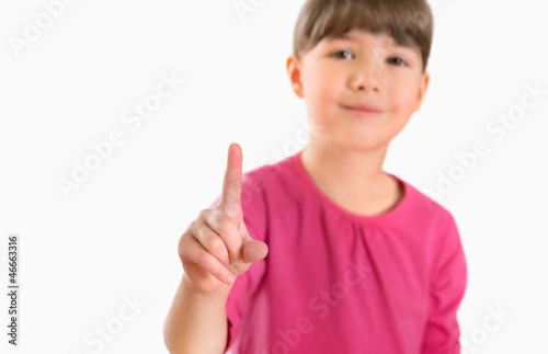 Photo: Girl touch screen isolated Girl touch screen isolated